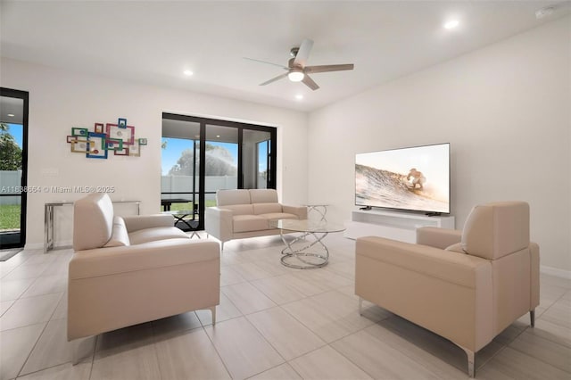 8036 NW 78th St, Tamarac, FL 33321 - living area with a ceiling fan, plenty of natural light, recessed lighting, and light tile patterned floors