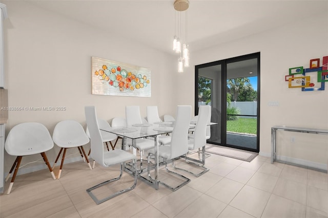 8036 NW 78th St, Tamarac, FL 33321 - dining space featuring baseboards and tile patterned floors