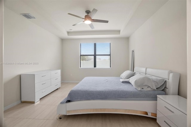 8036 NW 78th St, Tamarac, FL 33321 - bedroom featuring a raised ceiling, ceiling fan, and light tile patterned floors