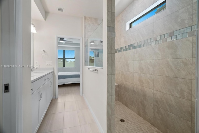 8036 NW 78th St, Tamarac, FL 33321 - full bath featuring ensuite bath, a walk in shower, vanity, tile patterned flooring, and a ceiling fan