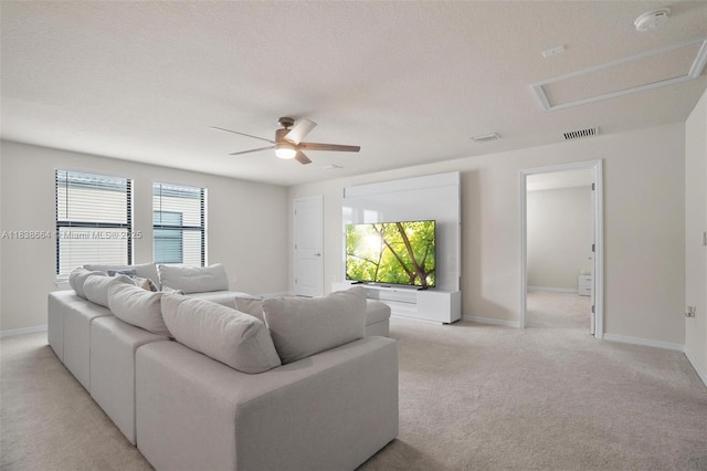 8036 NW 78th St, Tamarac, FL 33321 - living area with light colored carpet, attic access, and ceiling fan