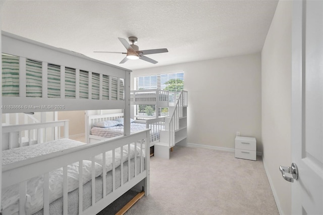 8036 NW 78th St, Tamarac, FL 33321 - bedroom featuring carpet floors, ceiling fan, and a textured ceiling