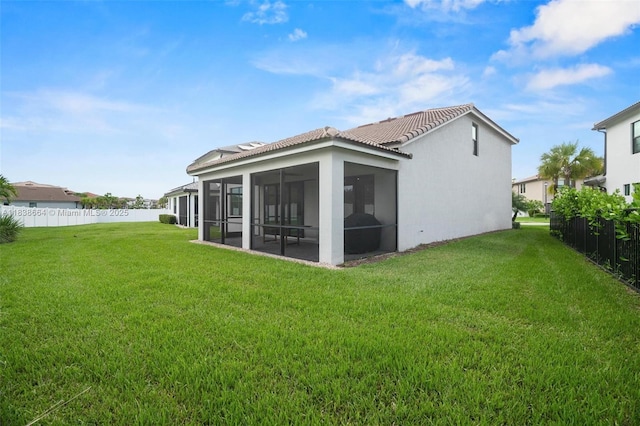 8036 NW 78th St, Tamarac, FL 33321 - back of house featuring a sunroom, a tile roof, and stucco siding