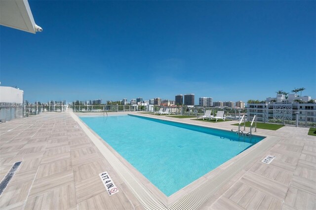 1025 92nd St Unit 804, Bay Harbor Islands, FL 33154 - community pool featuring a patio