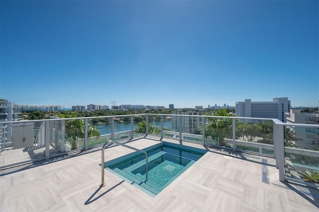 1025 92nd St Unit 804, Bay Harbor Islands, FL 33154 - view of swimming pool featuring a view of city and a water view