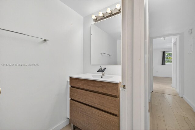 1821 Jefferson Ave Unit 202, Miami Beach, FL 33139 - bathroom featuring vanity and wood finished floors