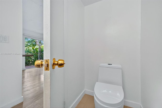 1821 Jefferson Ave Unit 202, Miami Beach, FL 33139 - bathroom with baseboards and wood finished floors