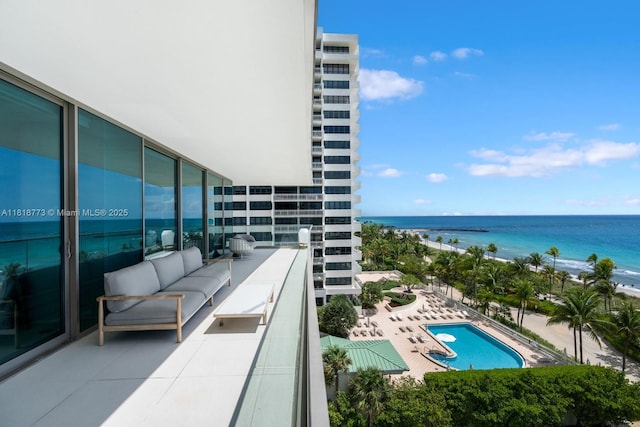 10203 Collins Ave Unit 701, Bal Harbour, FL 33154 - balcony with a water view, view of pool, and an outdoor hangout area