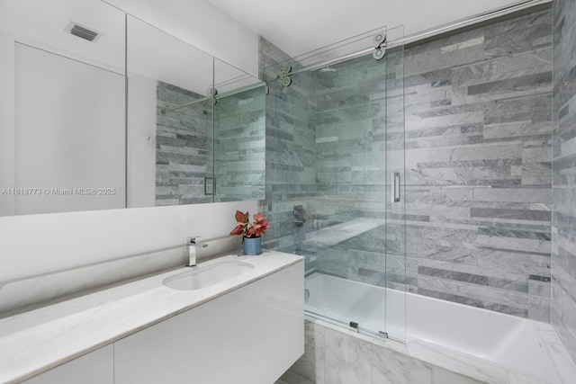 10203 Collins Ave Unit 701, Bal Harbour, FL 33154 - full bathroom with tiled shower / bath and vanity