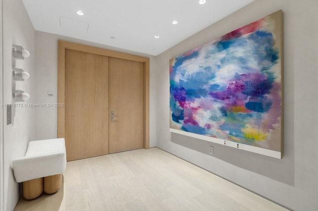 10203 Collins Ave Unit 701, Bal Harbour, FL 33154 - hallway featuring recessed lighting and light wood-style floors