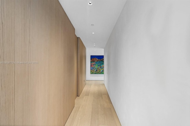 10203 Collins Ave Unit 701, Bal Harbour, FL 33154 - corridor with light wood-style flooring and recessed lighting