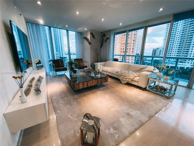 465 Brickell Ave Unit 1101, Miami, FL 33131 - living room featuring floor to ceiling windows, a city view, and recessed lighting
