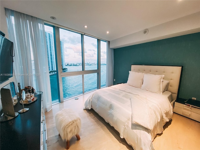 465 Brickell Ave Unit 1101, Miami, FL 33131 - bedroom with floor to ceiling windows and recessed lighting