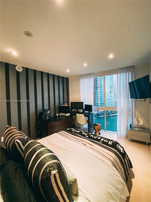 465 Brickell Ave Unit 1101, Miami, FL 33131 - carpeted bedroom featuring recessed lighting and wallpapered walls