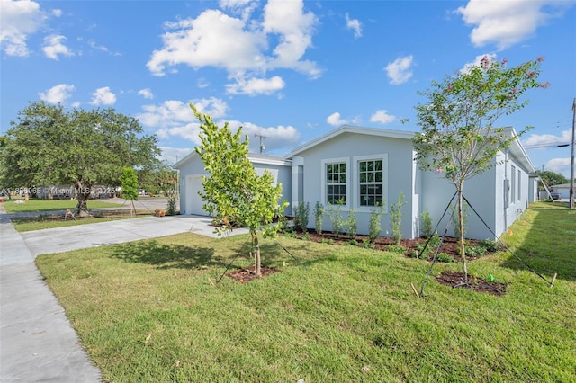3451 SW 19th St, Fort Lauderdale, FL 33312 - ranch-style house with concrete driveway, a garage, stucco siding, and a front yard