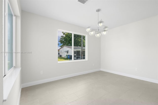 3451 SW 19th St, Fort Lauderdale, FL 33312 - spare room with a chandelier and baseboards
