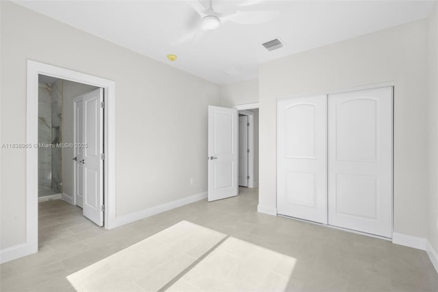 3451 SW 19th St, Fort Lauderdale, FL 33312 - unfurnished bedroom with a closet, ceiling fan, ensuite bathroom, and light tile patterned floors