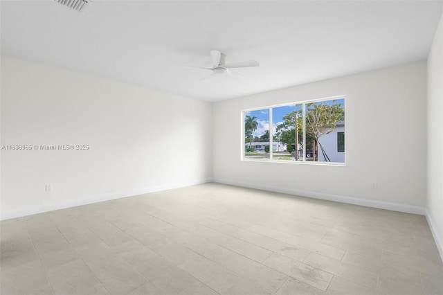 3451 SW 19th St, Fort Lauderdale, FL 33312 - spare room featuring ceiling fan and baseboards