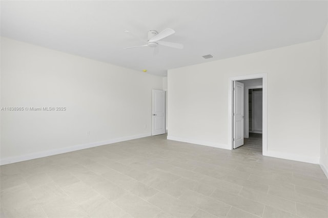 3451 SW 19th St, Fort Lauderdale, FL 33312 - spare room featuring a ceiling fan and baseboards