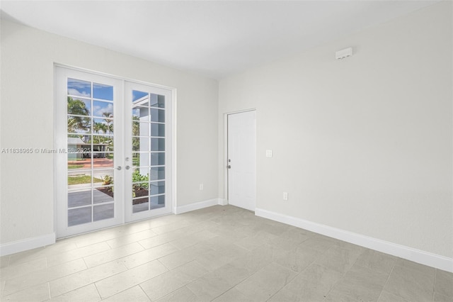 3451 SW 19th St, Fort Lauderdale, FL 33312 - unfurnished room featuring french doors and baseboards