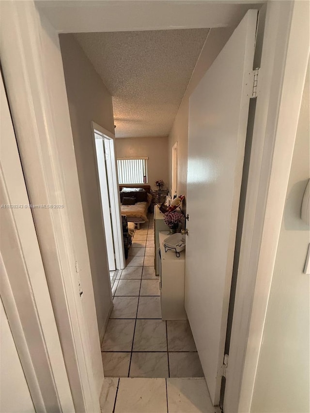 10726 SW 147th Pl, Miami, FL 33196 - hall with a textured ceiling