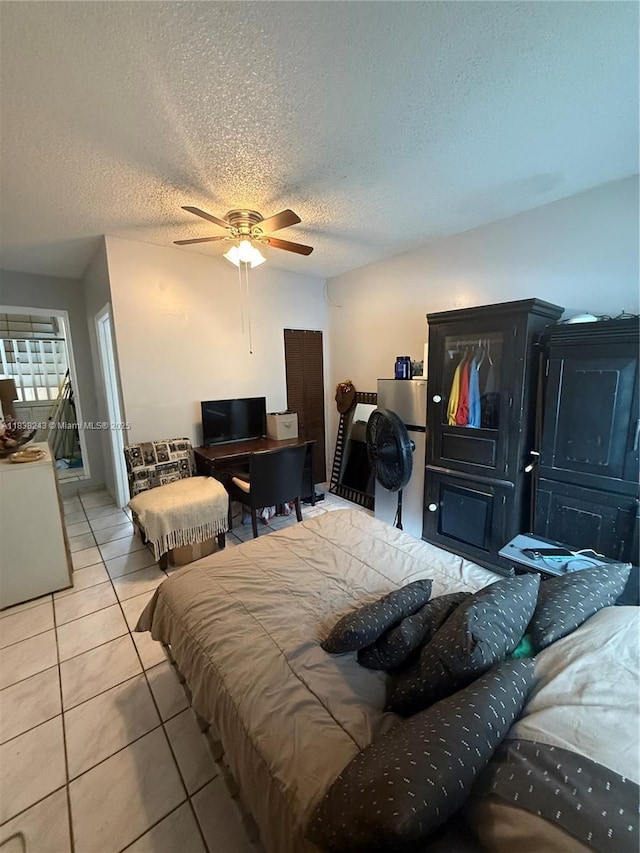 10726 SW 147th Pl, Miami, FL 33196 - bedroom featuring tile patterned flooring, a textured ceiling, and a ceiling fan