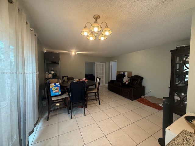 10726 SW 147th Pl, Miami, FL 33196 - dining area featuring a chandelier, light tile patterned floors, and a textured ceiling
