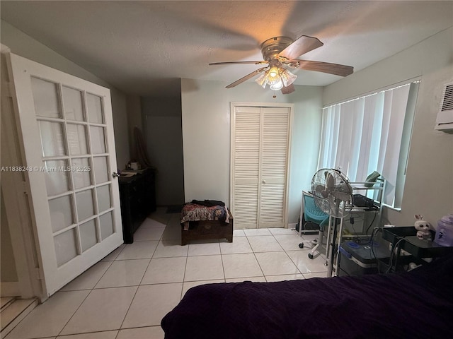 10726 SW 147th Pl, Miami, FL 33196 - bedroom featuring a closet, light tile patterned flooring, and a ceiling fan