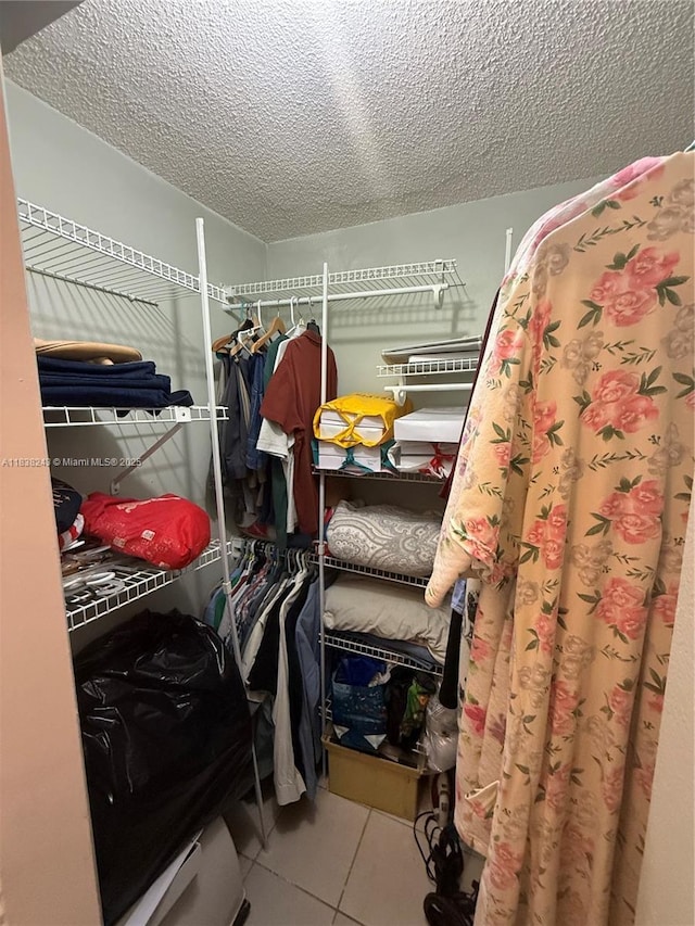 10726 SW 147th Pl, Miami, FL 33196 - spacious closet with tile patterned flooring