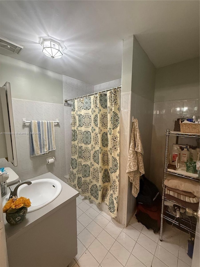 10726 SW 147th Pl, Miami, FL 33196 - bathroom with vanity, curtained shower, tile patterned flooring, and tile walls