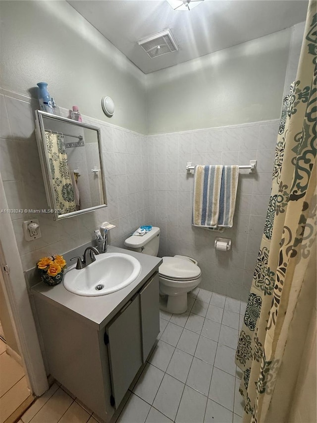 10726 SW 147th Pl, Miami, FL 33196 - bathroom with tile walls, tile patterned flooring, vanity, a wainscoted wall, and curtained shower