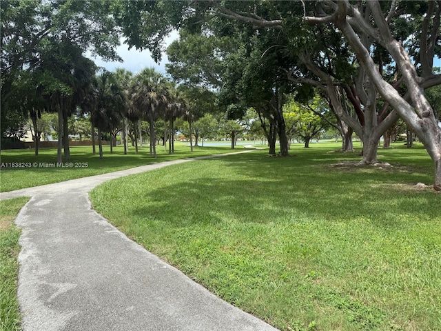 10726 SW 147th Pl, Miami, FL 33196 - view of property's community with a lawn