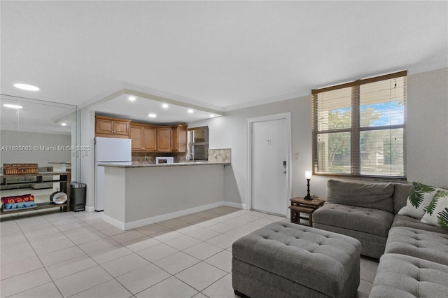 2400 NE 10th St Unit 104, Pompano Beach, FL 33062 - living area featuring light tile patterned floors and recessed lighting