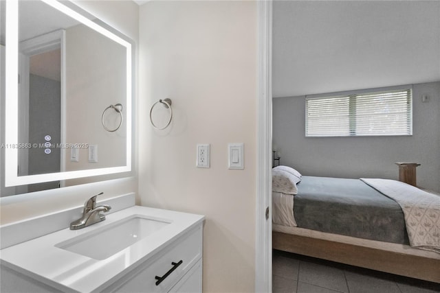 2400 NE 10th St Unit 104, Pompano Beach, FL 33062 - bathroom featuring connected bathroom, vanity, and tile patterned floors