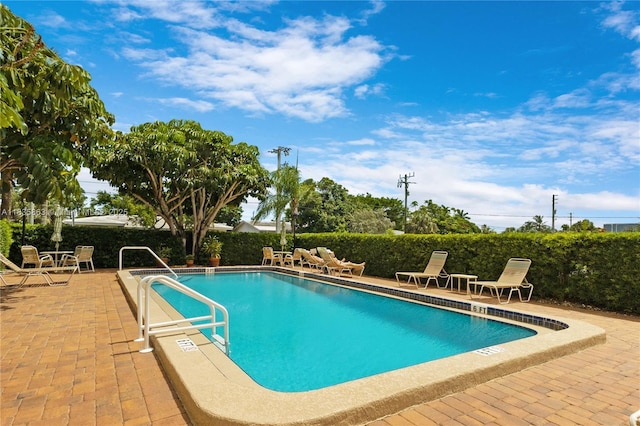 2400 NE 10th St Unit 104, Pompano Beach, FL 33062 - community pool featuring a patio area