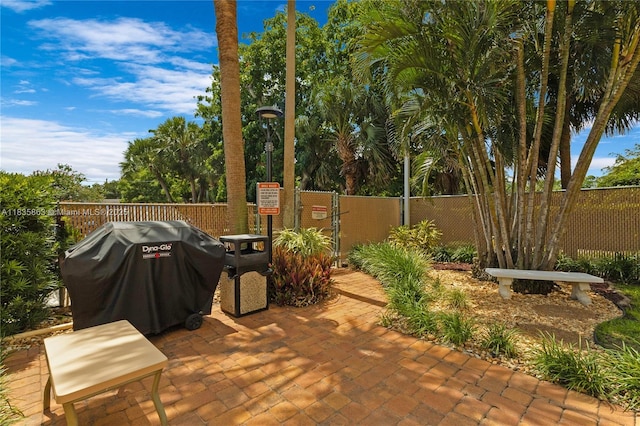 2400 NE 10th St Unit 104, Pompano Beach, FL 33062 - view of patio with a grill
