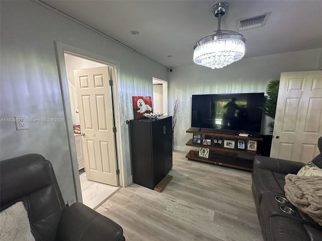 1249 S Flamingo Rd, Davie, FL 33325 - living room featuring a chandelier