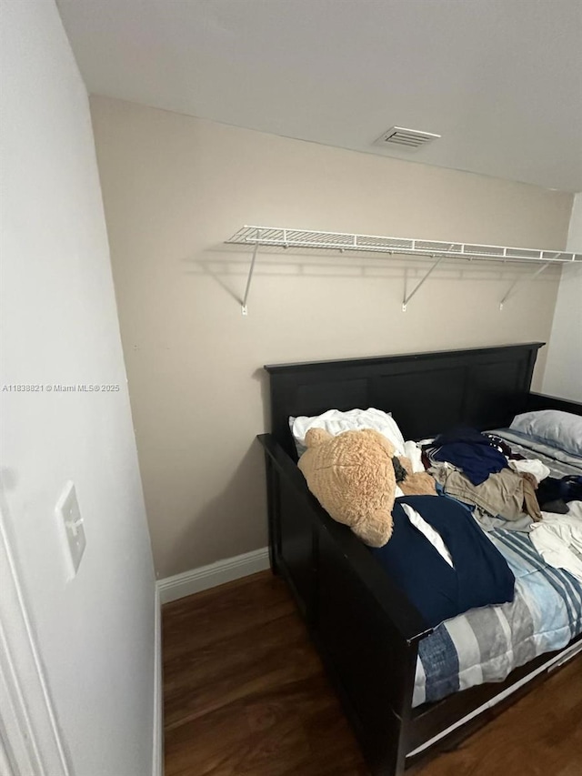 1249 S Flamingo Rd, Davie, FL 33325 - bedroom with dark wood finished floors