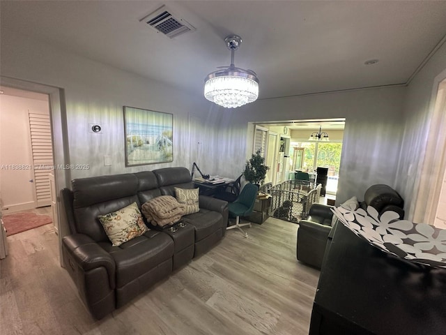 1249 S Flamingo Rd, Davie, FL 33325 - living area with a chandelier and wood finished floors