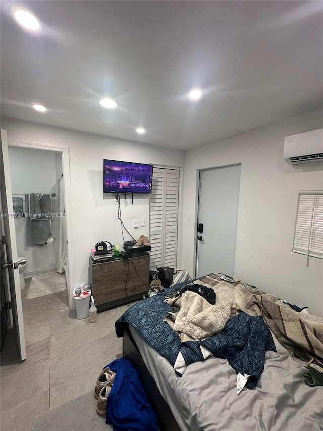 1249 S Flamingo Rd, Davie, FL 33325 - bedroom featuring a wall mounted AC, recessed lighting, and ensuite bathroom