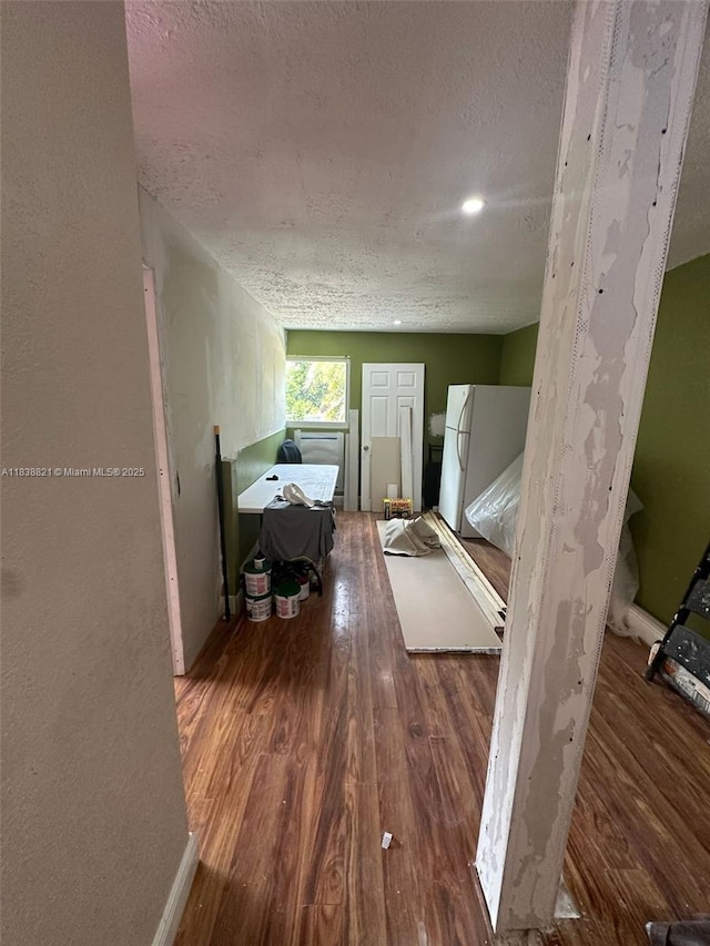 1249 S Flamingo Rd, Davie, FL 33325 - hallway featuring wood finished floors and a textured ceiling