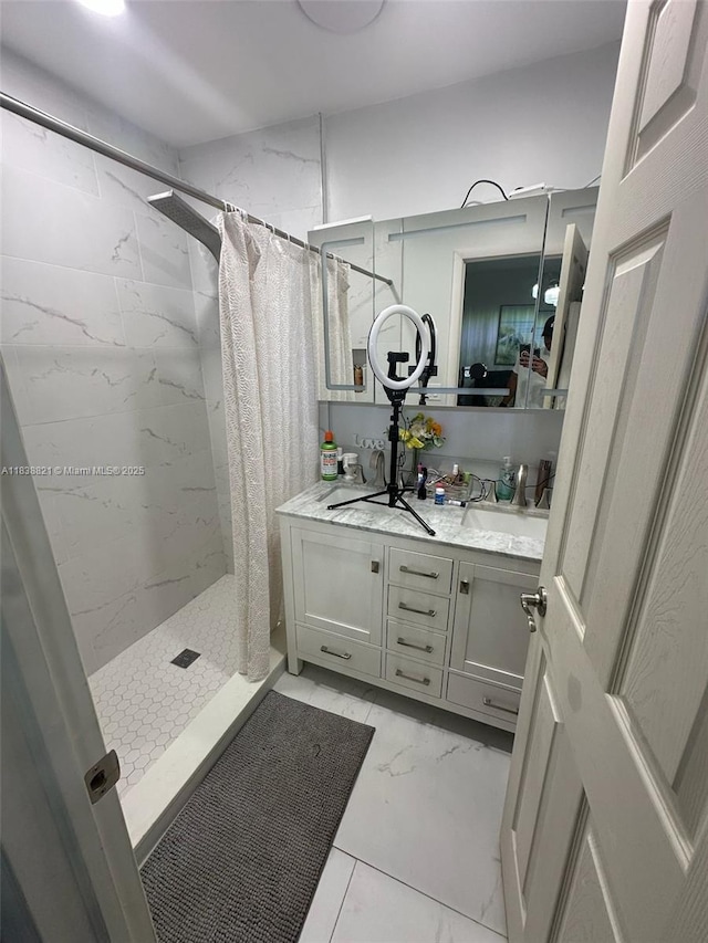 1249 S Flamingo Rd, Davie, FL 33325 - bathroom with a shower stall, double vanity, and marble finish floors