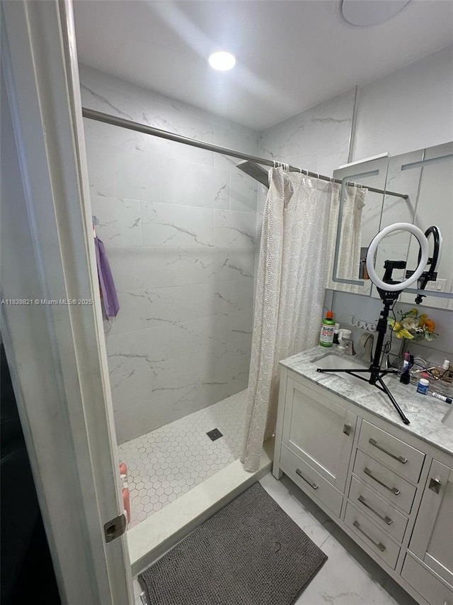 1249 S Flamingo Rd, Davie, FL 33325 - bathroom with vanity, a stall shower, and marble finish floors