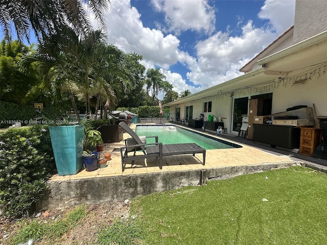 1249 S Flamingo Rd, Davie, FL 33325 - view of swimming pool featuring a patio and a yard