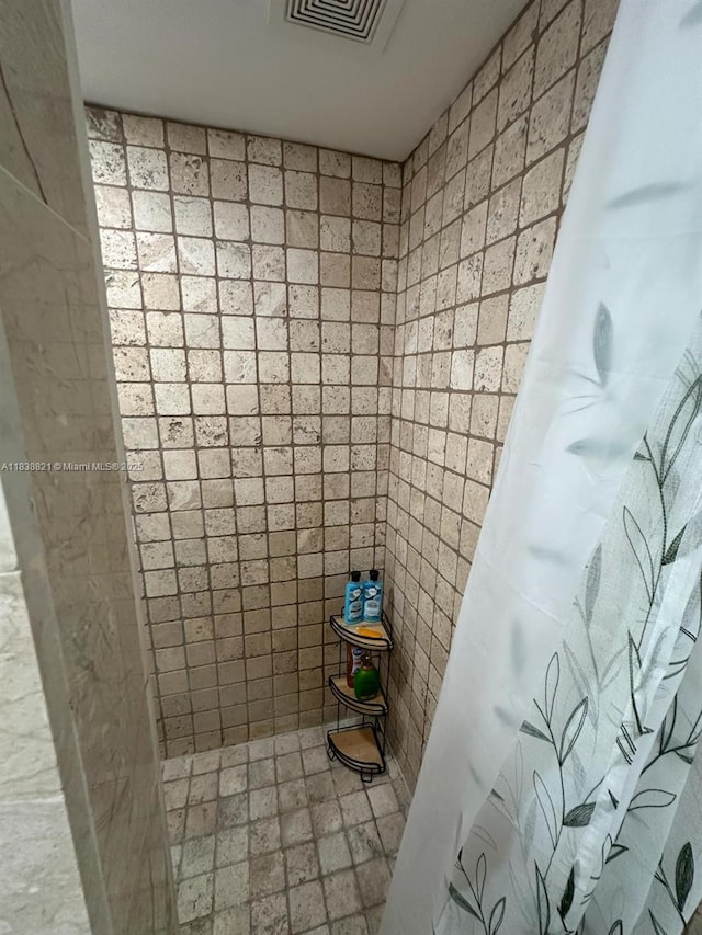 1249 S Flamingo Rd, Davie, FL 33325 - bathroom with a shower with shower curtain and tile walls