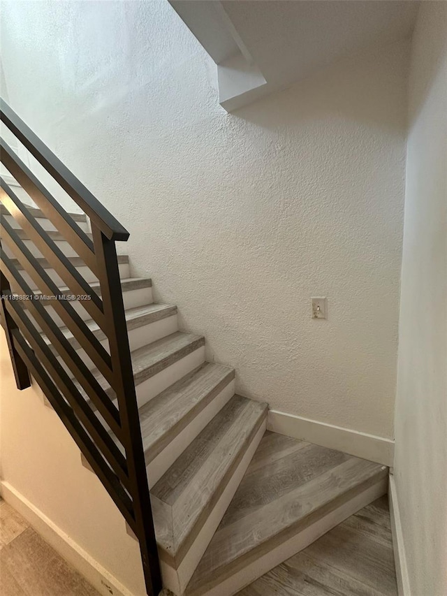 1249 S Flamingo Rd, Davie, FL 33325 - staircase with baseboards and wood finished floors