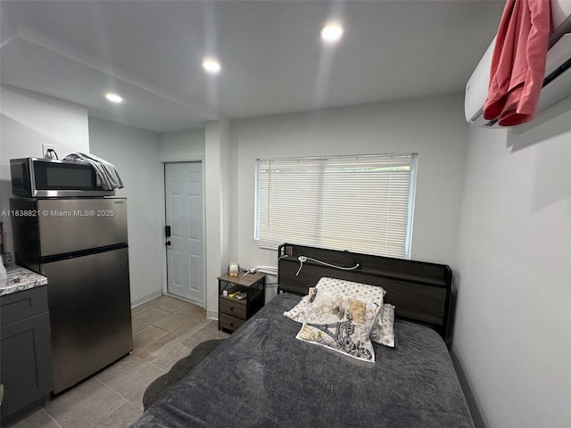 1249 S Flamingo Rd, Davie, FL 33325 - bedroom featuring freestanding refrigerator, an AC wall unit, recessed lighting, and light tile patterned floors