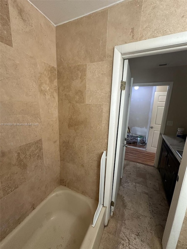 1249 S Flamingo Rd, Davie, FL 33325 - bathroom featuring stone tile flooring and vanity