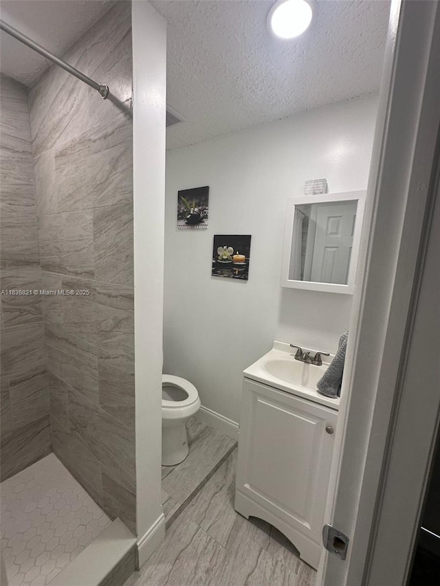1249 S Flamingo Rd, Davie, FL 33325 - full bath featuring vanity, a shower stall, marble finish flooring, and a textured ceiling