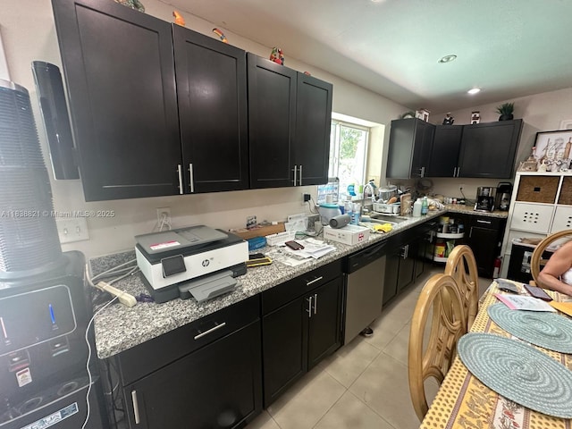 1249 S Flamingo Rd, Davie, FL 33325 - kitchen featuring dark cabinets, dishwasher, light tile patterned flooring, and light stone countertops